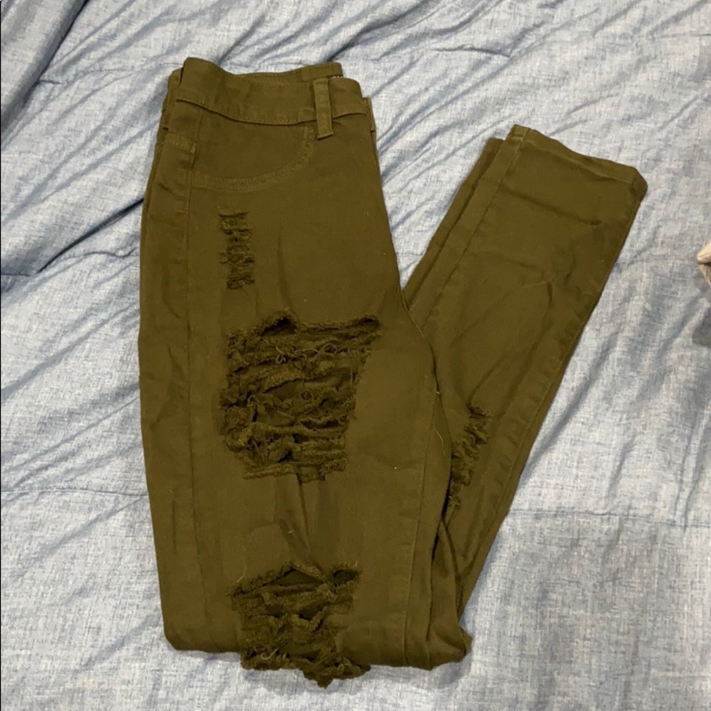 Green ripped jeans